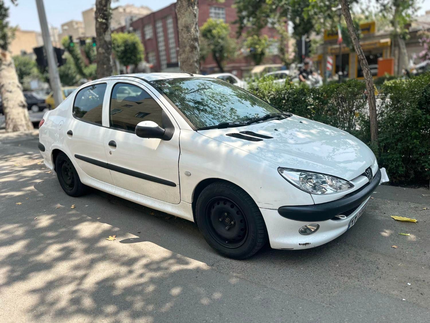 پژو ۲۰۶ صندوق دار v8 - 1394