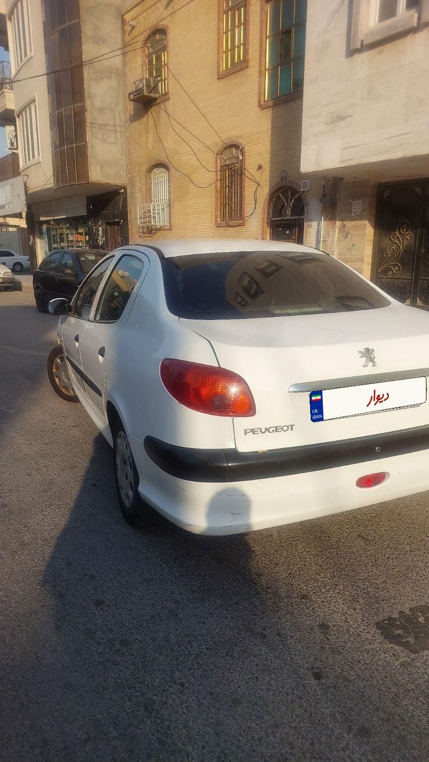 پژو ۲۰۶ صندوق دار v8 - 1398