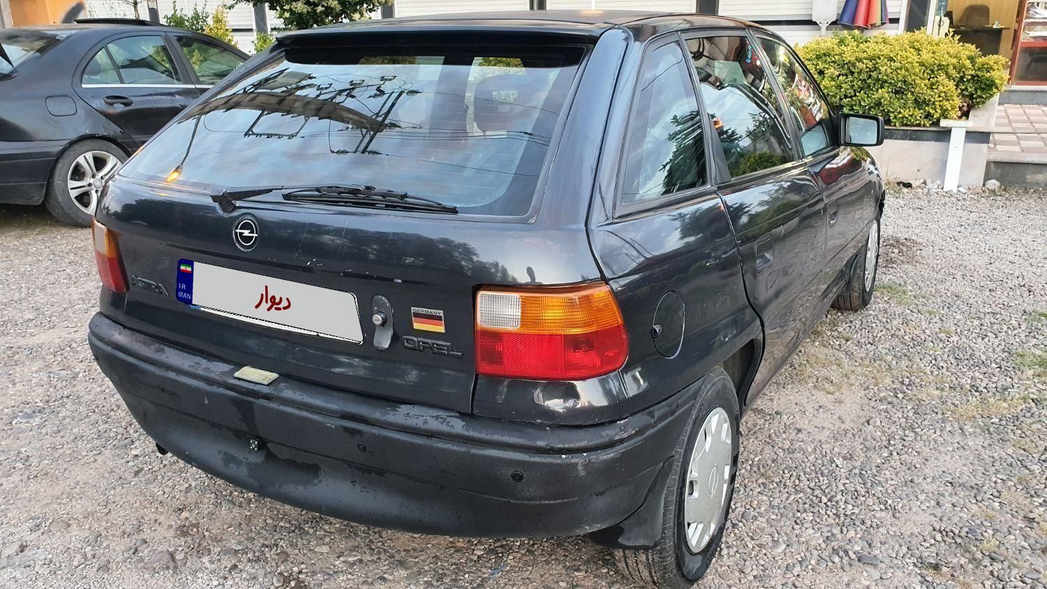 اپل آسترا هاچ بک 1400 شرکتی J - 2015