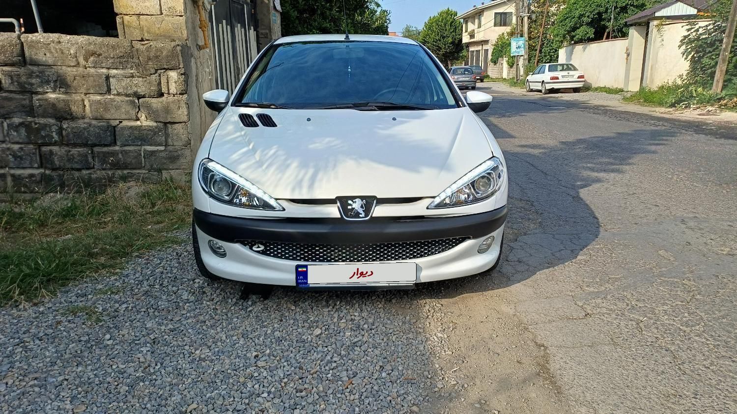 پژو ۲۰۶ صندوق دار v8 - 1394