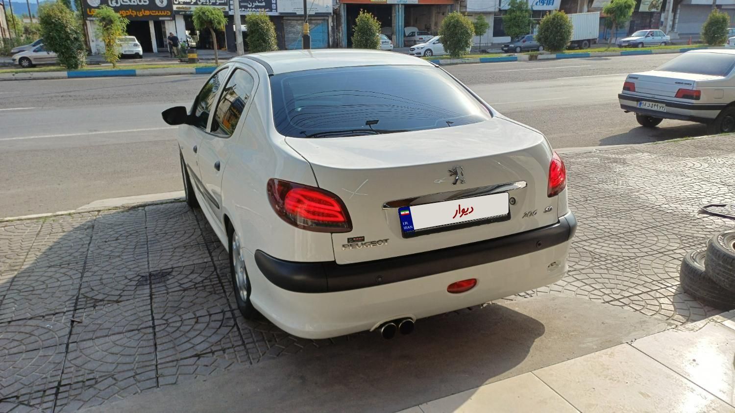 پژو ۲۰۶ صندوق دار v8 - 1394