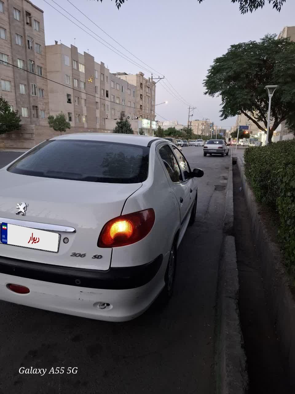 پژو ۲۰۶ صندوق دار v8 - 1397
