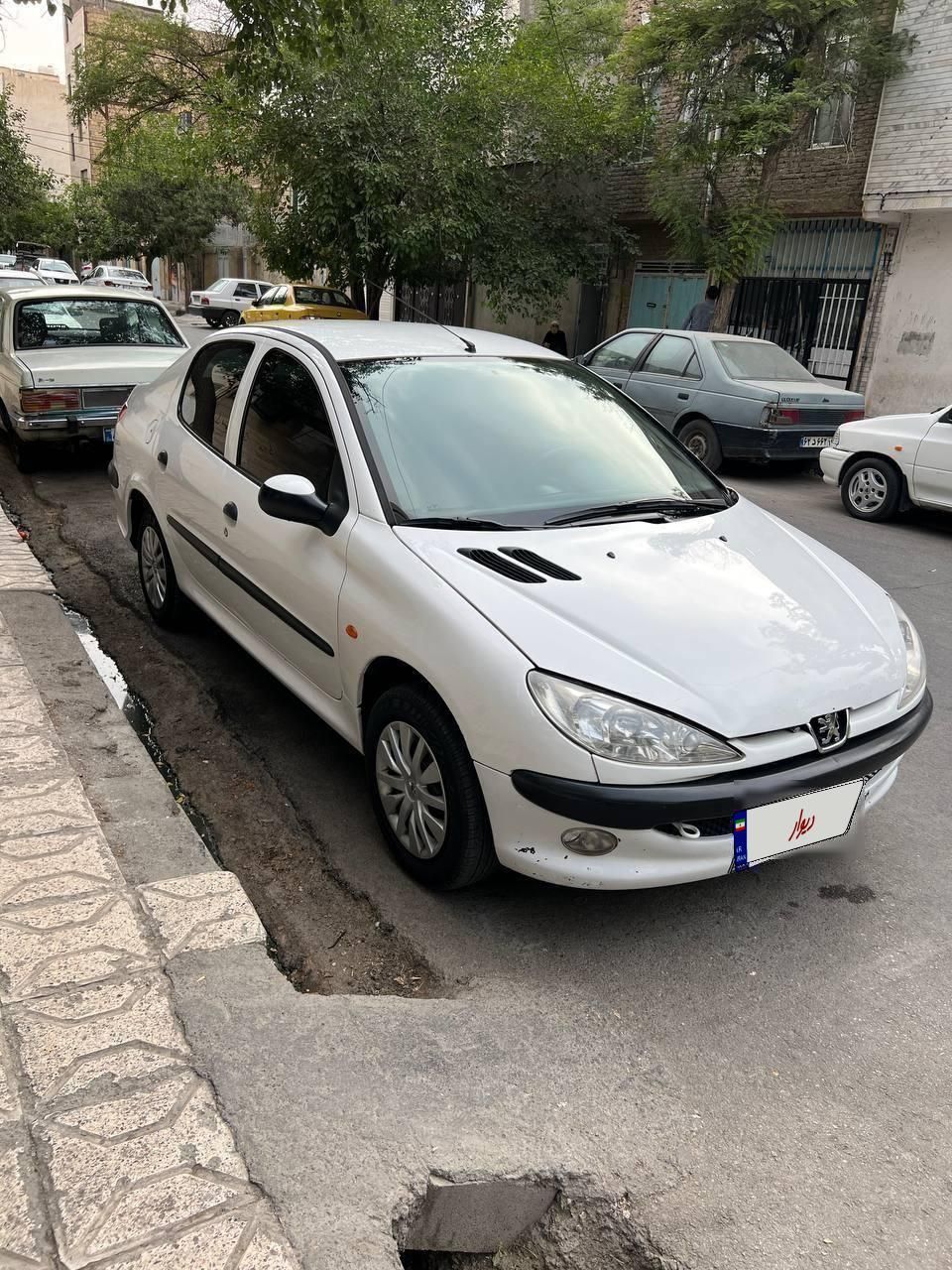 پژو ۲۰۶ صندوق دار v8 - 1397