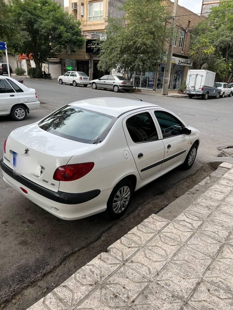 پژو ۲۰۶ صندوق دار v8 - 1397