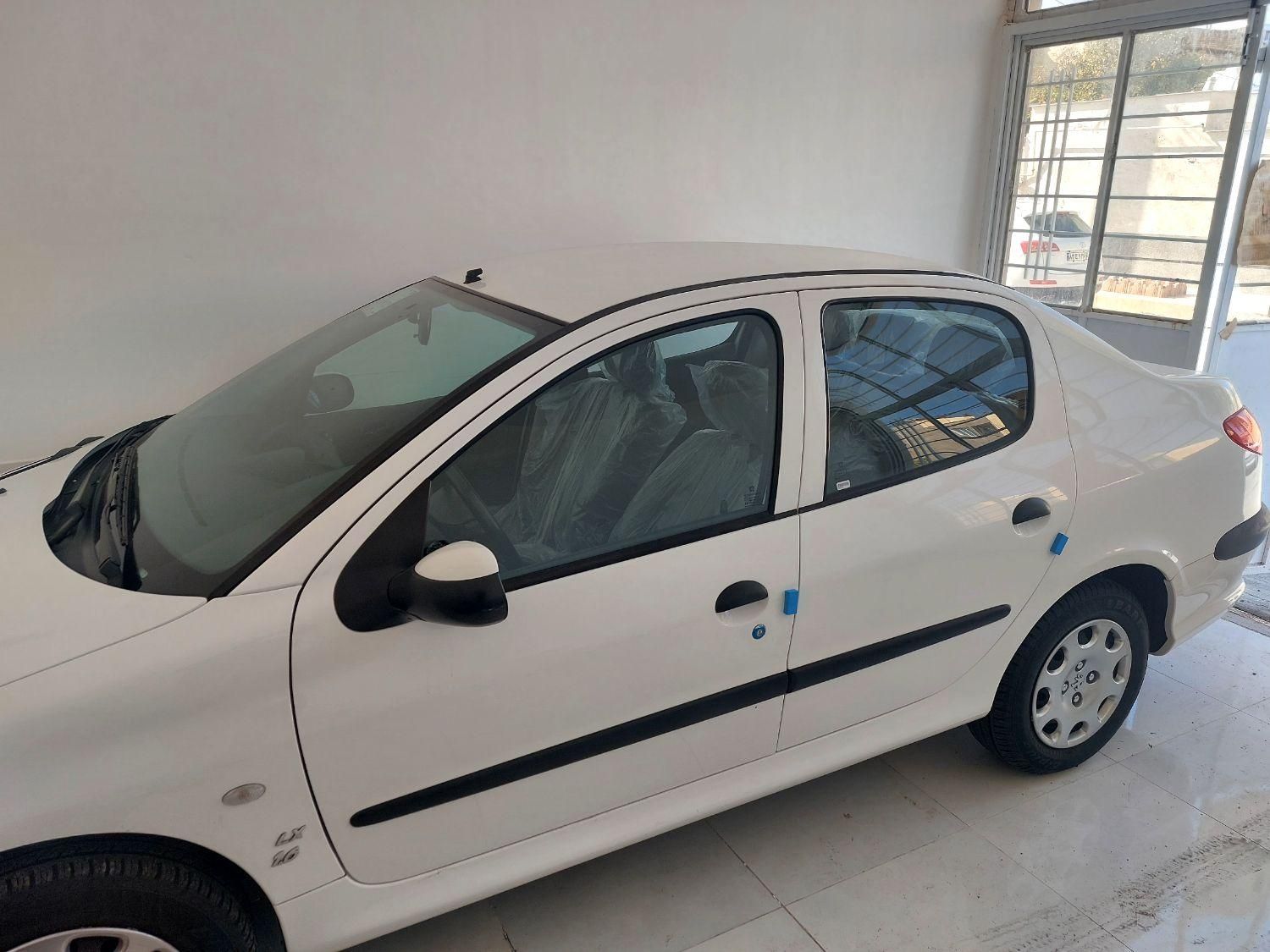 پژو ۲۰۶ صندوق دار v8 - 1399