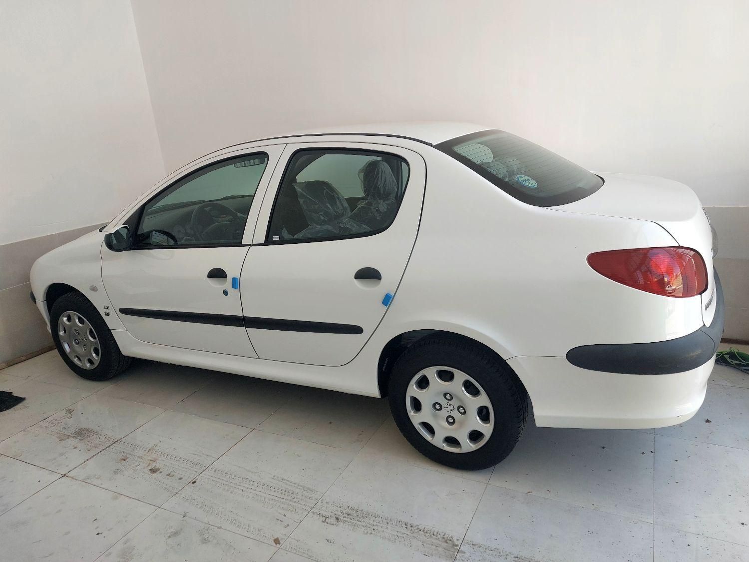 پژو ۲۰۶ صندوق دار v8 - 1399