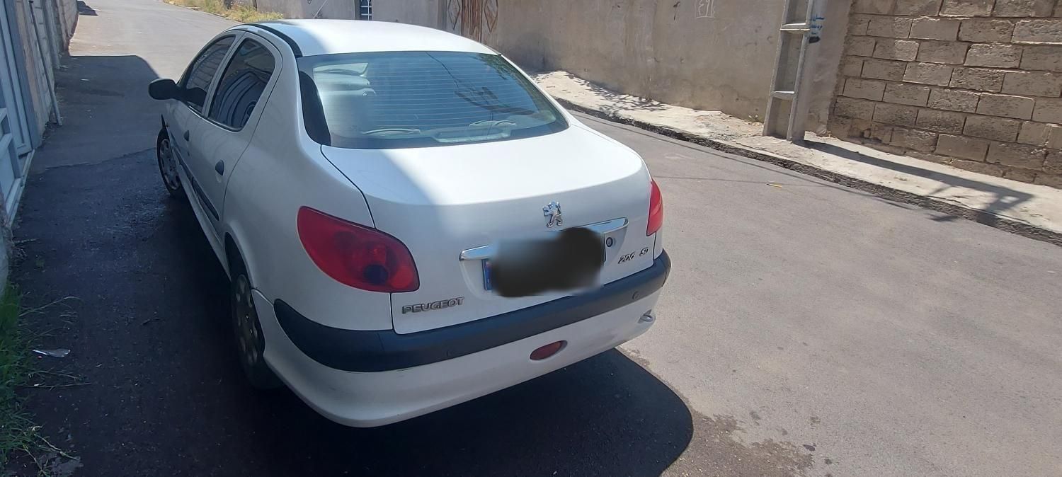 پژو ۲۰۶ صندوق دار v8 - 1394
