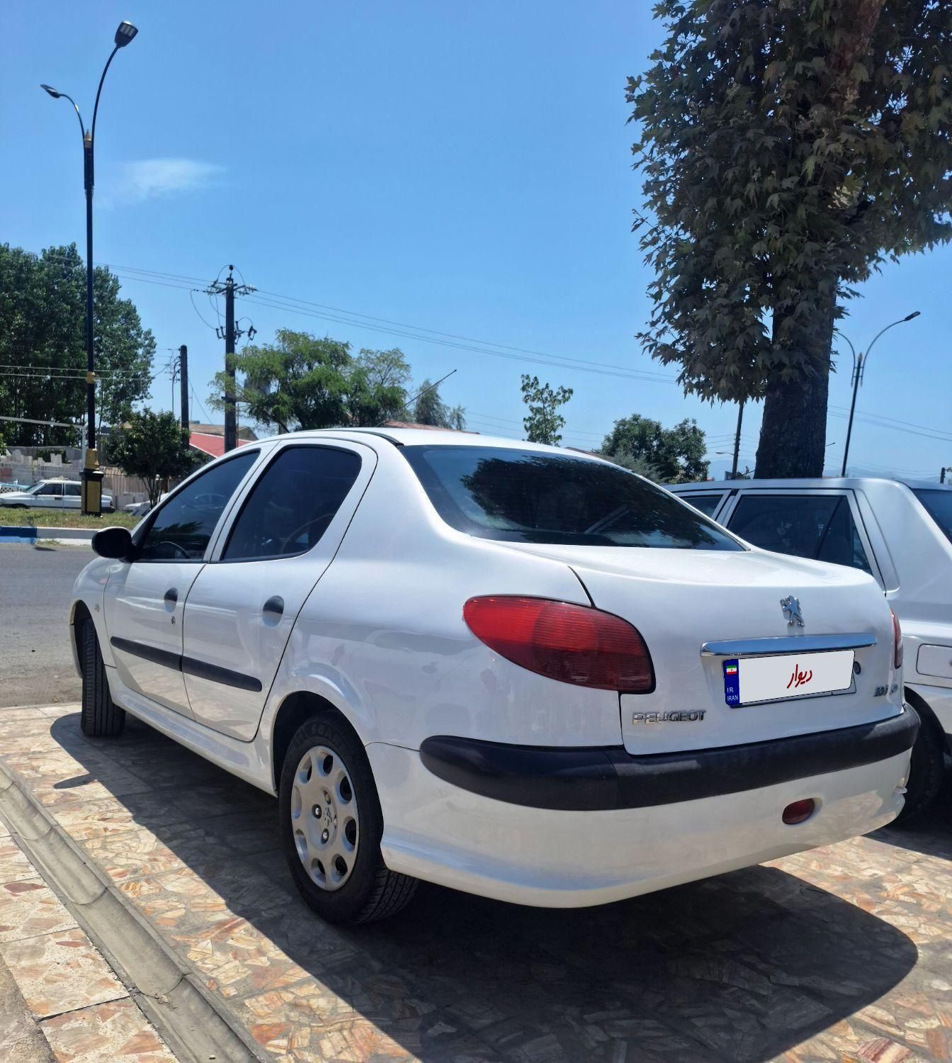 پژو ۲۰۶ صندوق دار v8 - 1389