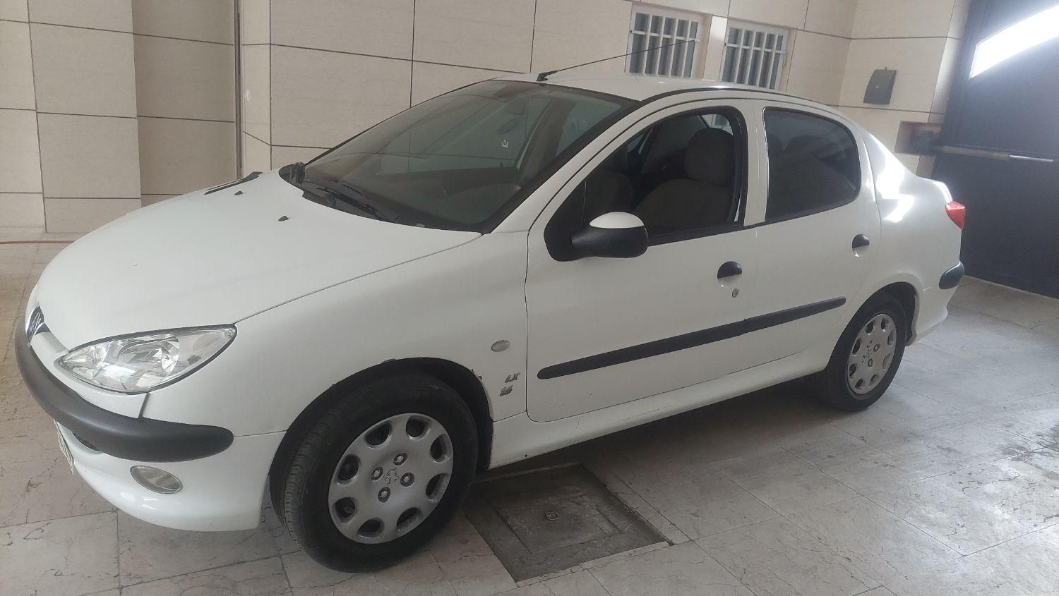 پژو ۲۰۶ صندوق دار v8 - 1397