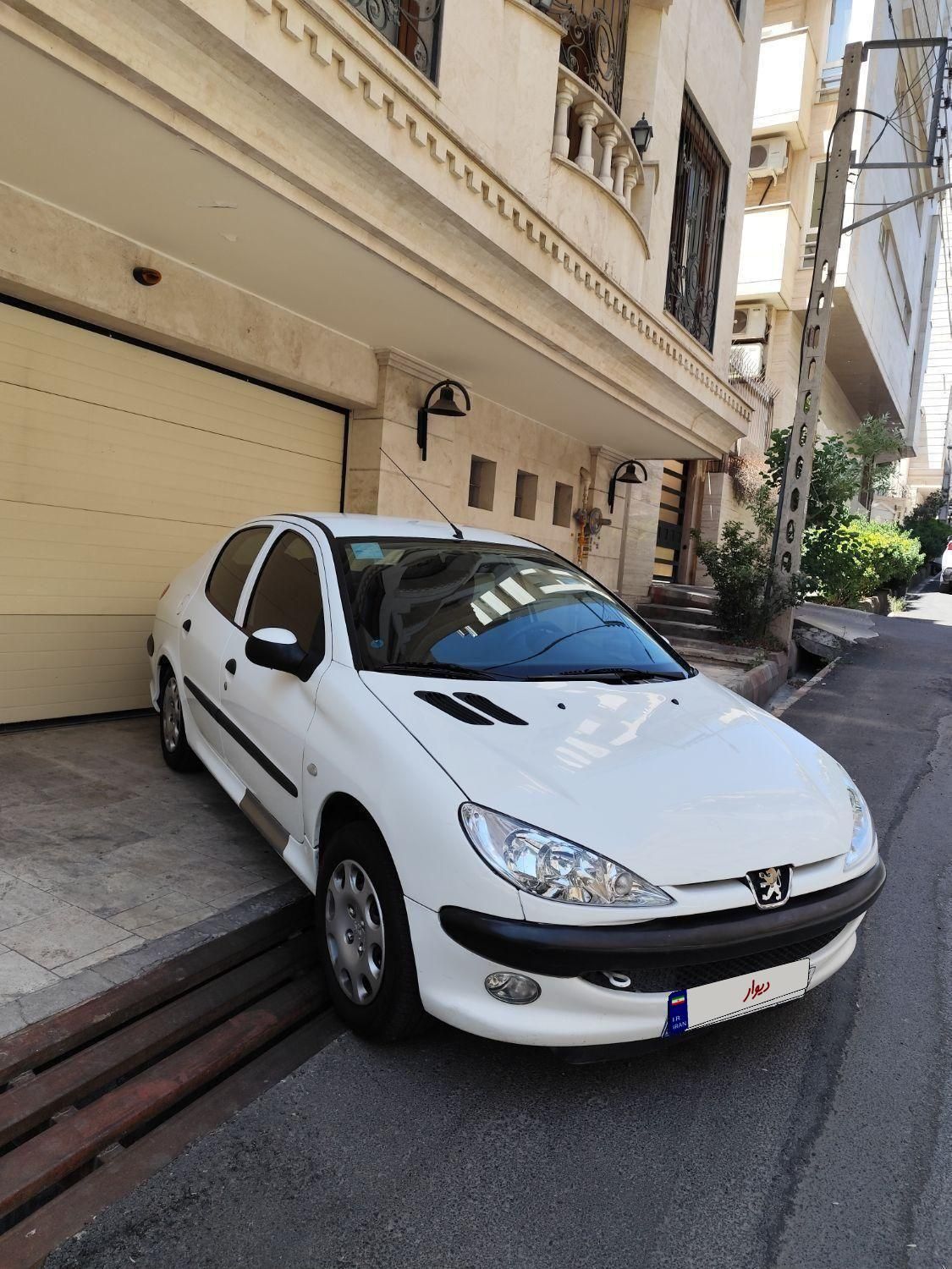 پژو ۲۰۶ صندوق دار v8 - 1396