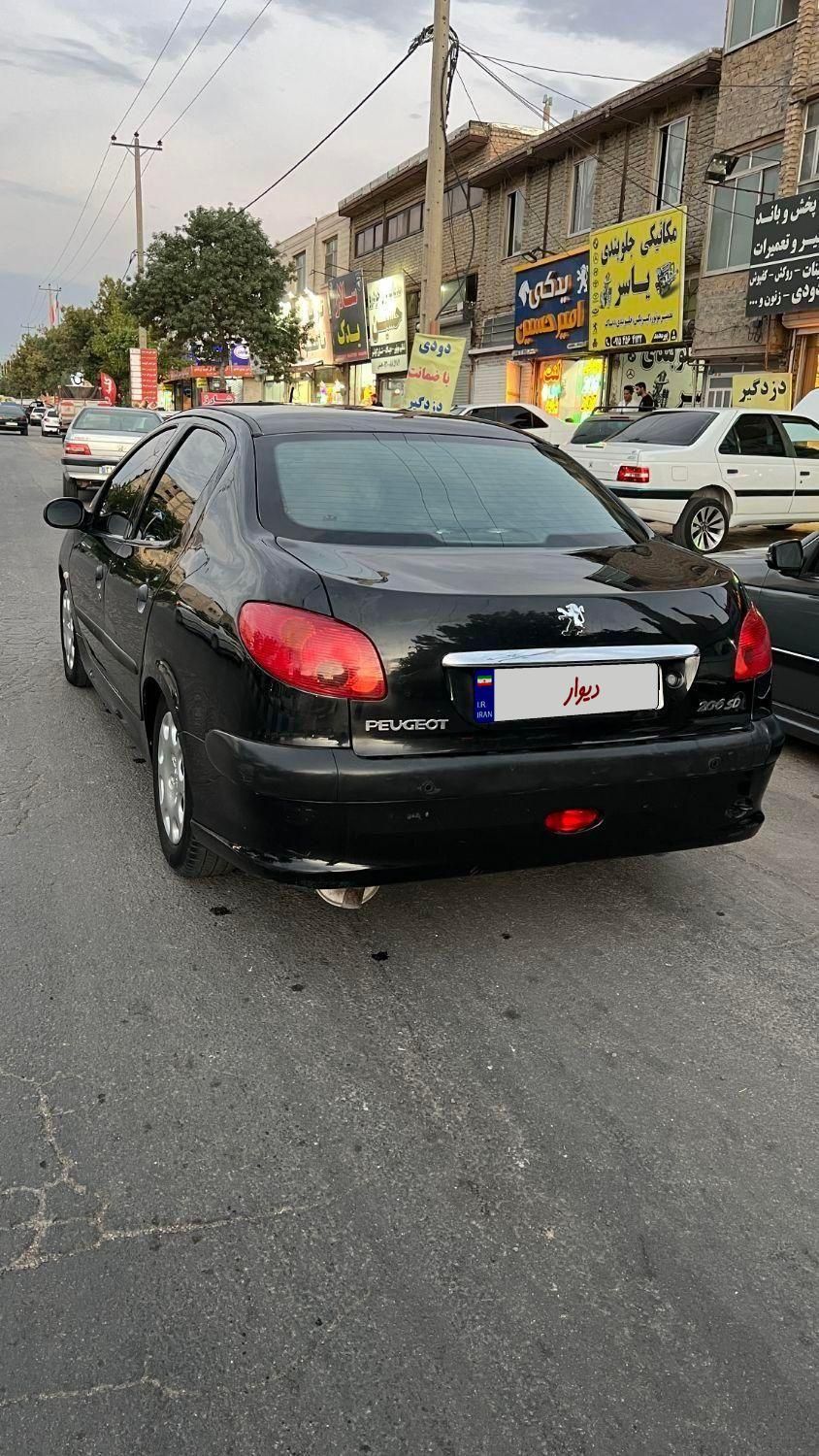 پژو ۲۰۶ صندوق دار v8 - 1394