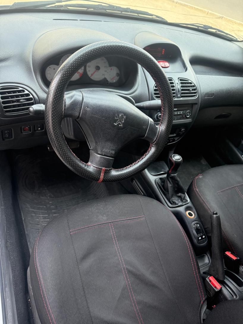 پژو ۲۰۶ صندوق دار v8 - 1399
