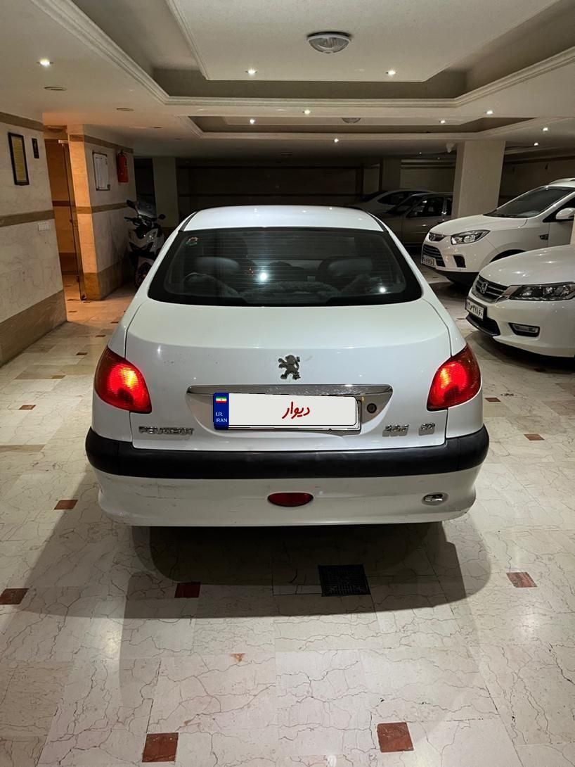پژو ۲۰۶ صندوق دار v8 - 1393