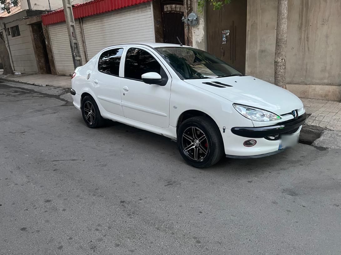 پژو ۲۰۶ صندوق دار v8 - 1396