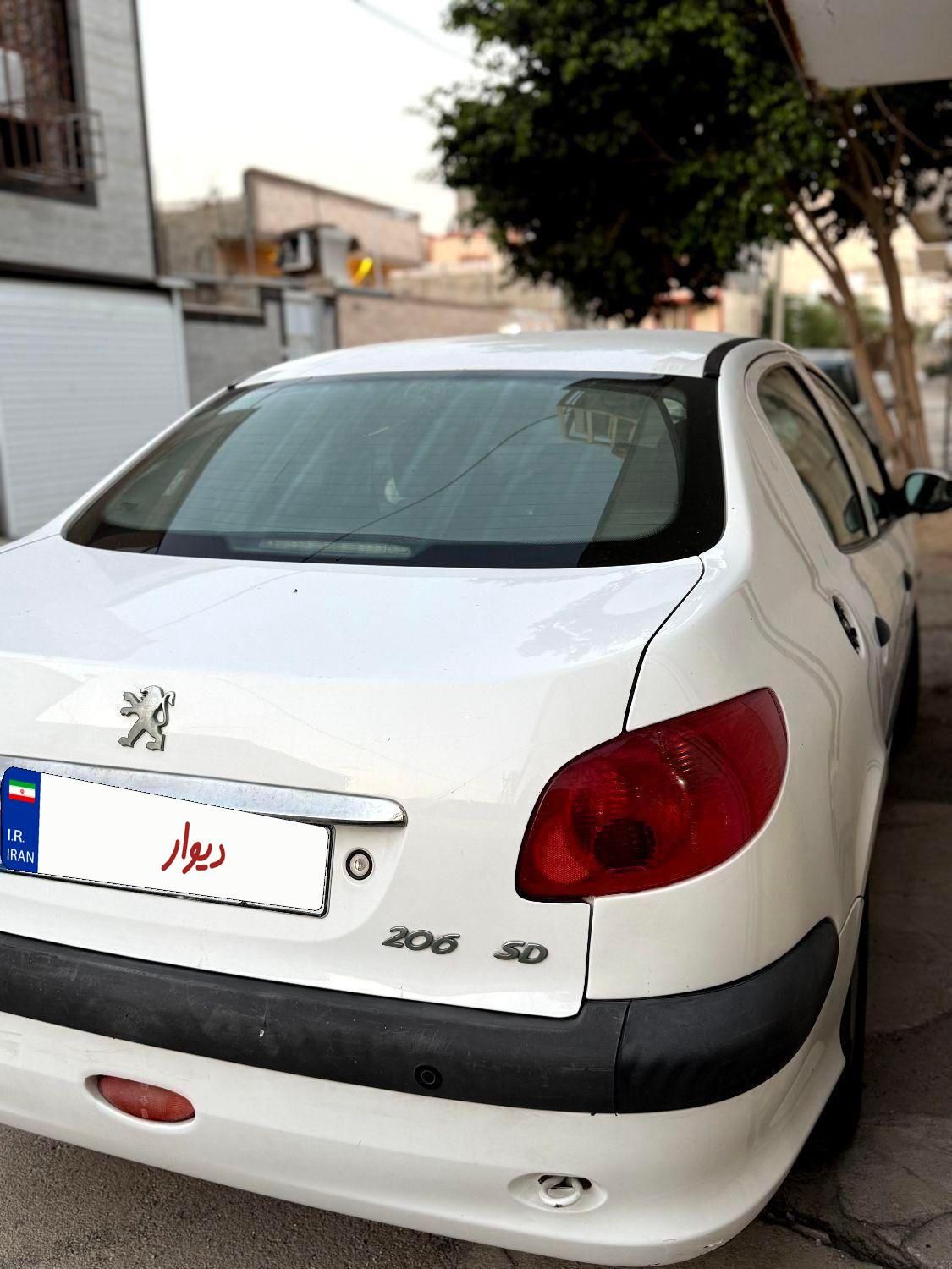 پژو ۲۰۶ صندوق دار v8 - 1394