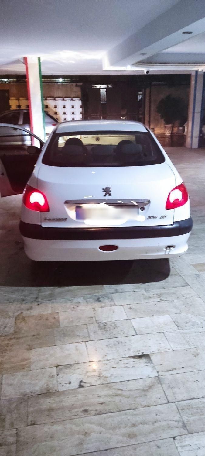 پژو ۲۰۶ صندوق دار v8 - 1396