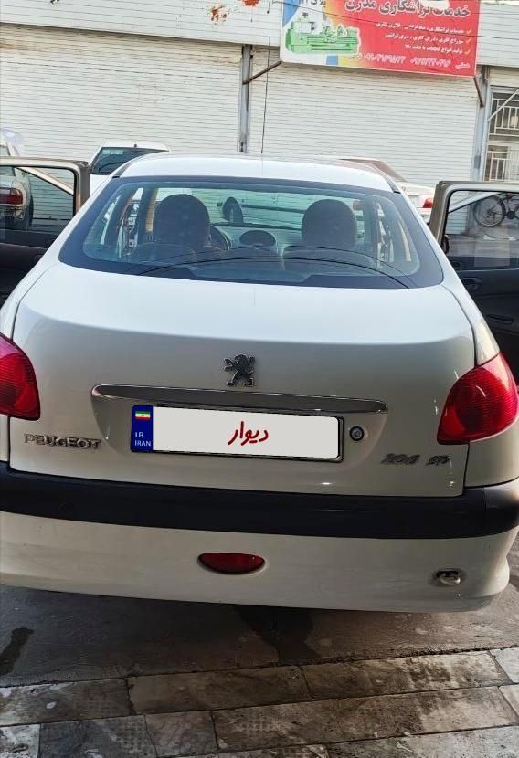 پژو ۲۰۶ صندوق دار v8 - 1399