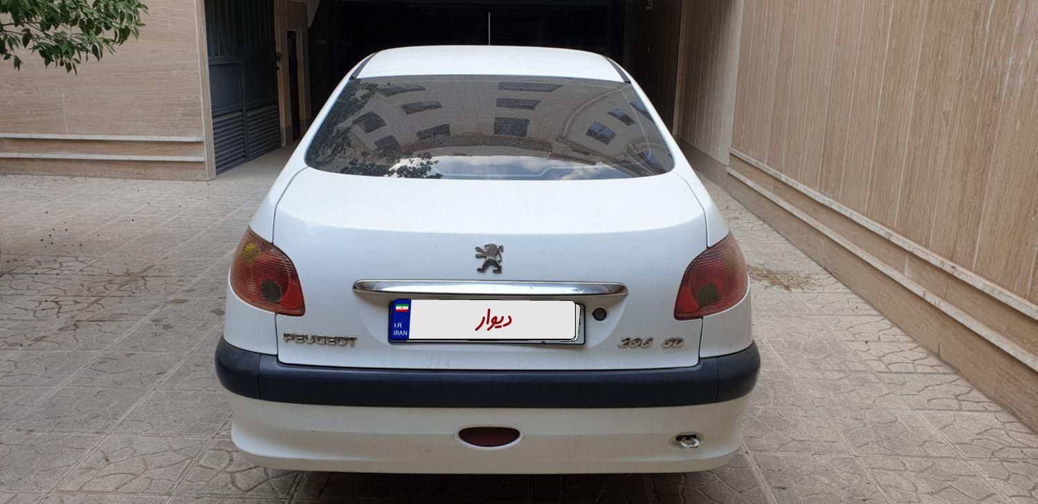 پژو ۲۰۶ صندوق دار v8 - 1391