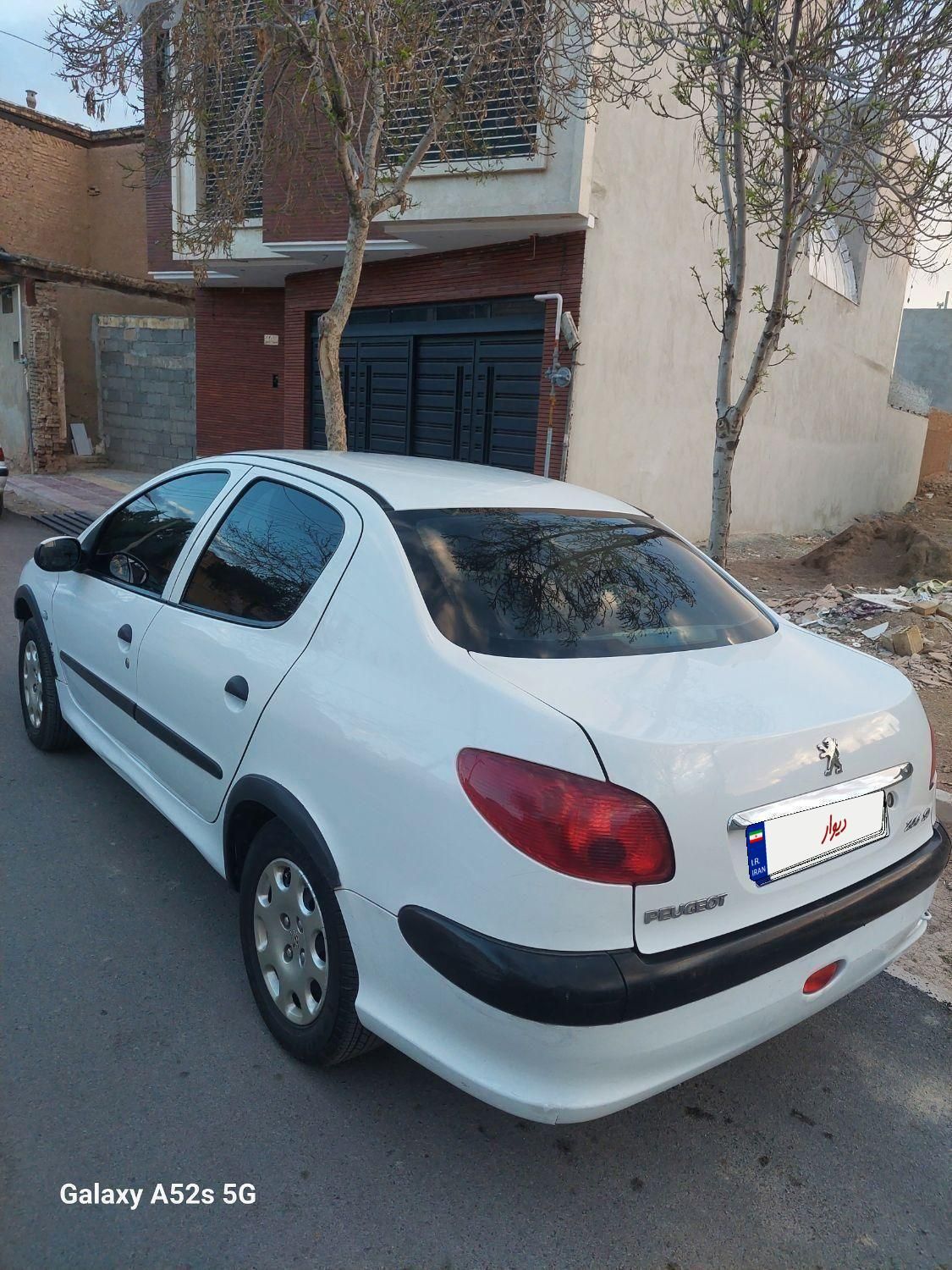پژو ۲۰۶ صندوق دار v8 - 1391