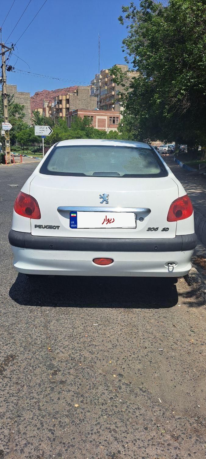 پژو ۲۰۶ صندوق دار v8 - 1396