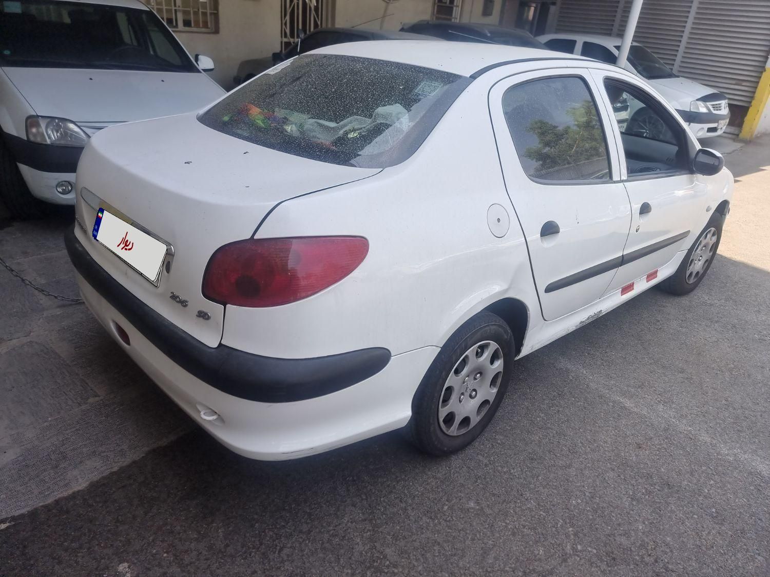 پژو ۲۰۶ صندوق دار v8 - 1395