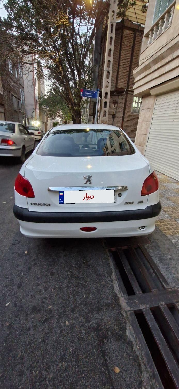 پژو ۲۰۶ صندوق دار v8 - 1394