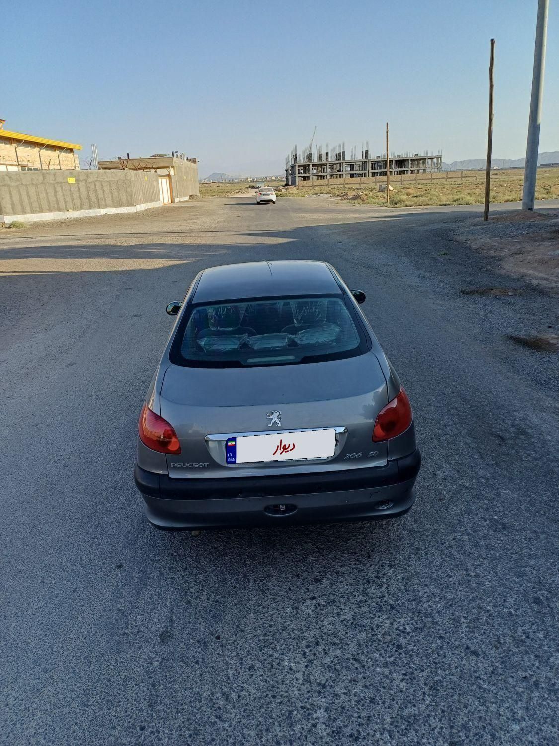 پژو ۲۰۶ صندوق دار v8 - 1391