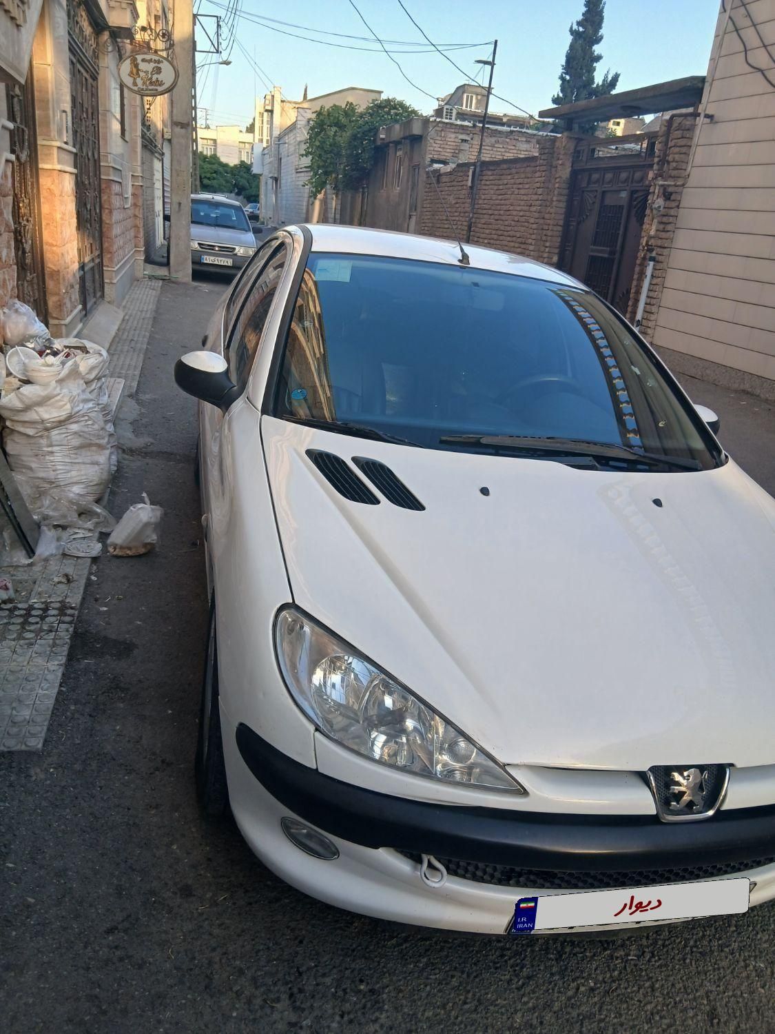 پژو ۲۰۶ صندوق دار v8 - 1395
