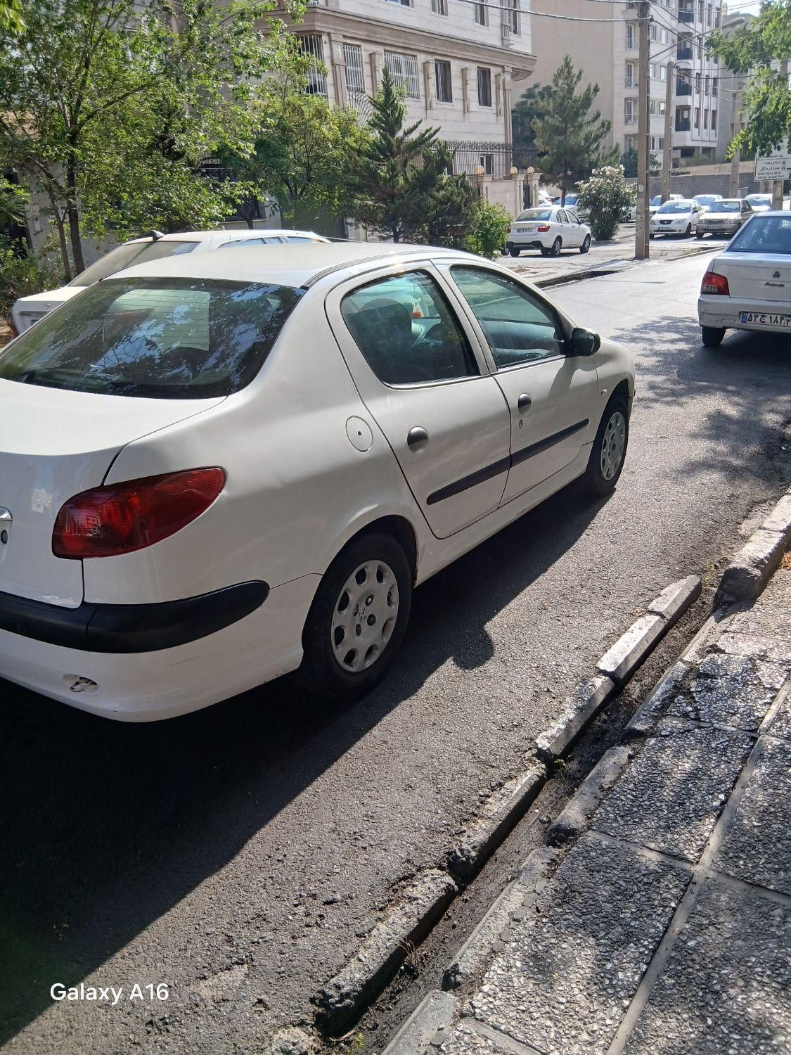 پژو ۲۰۶ صندوق دار v8 - 1396