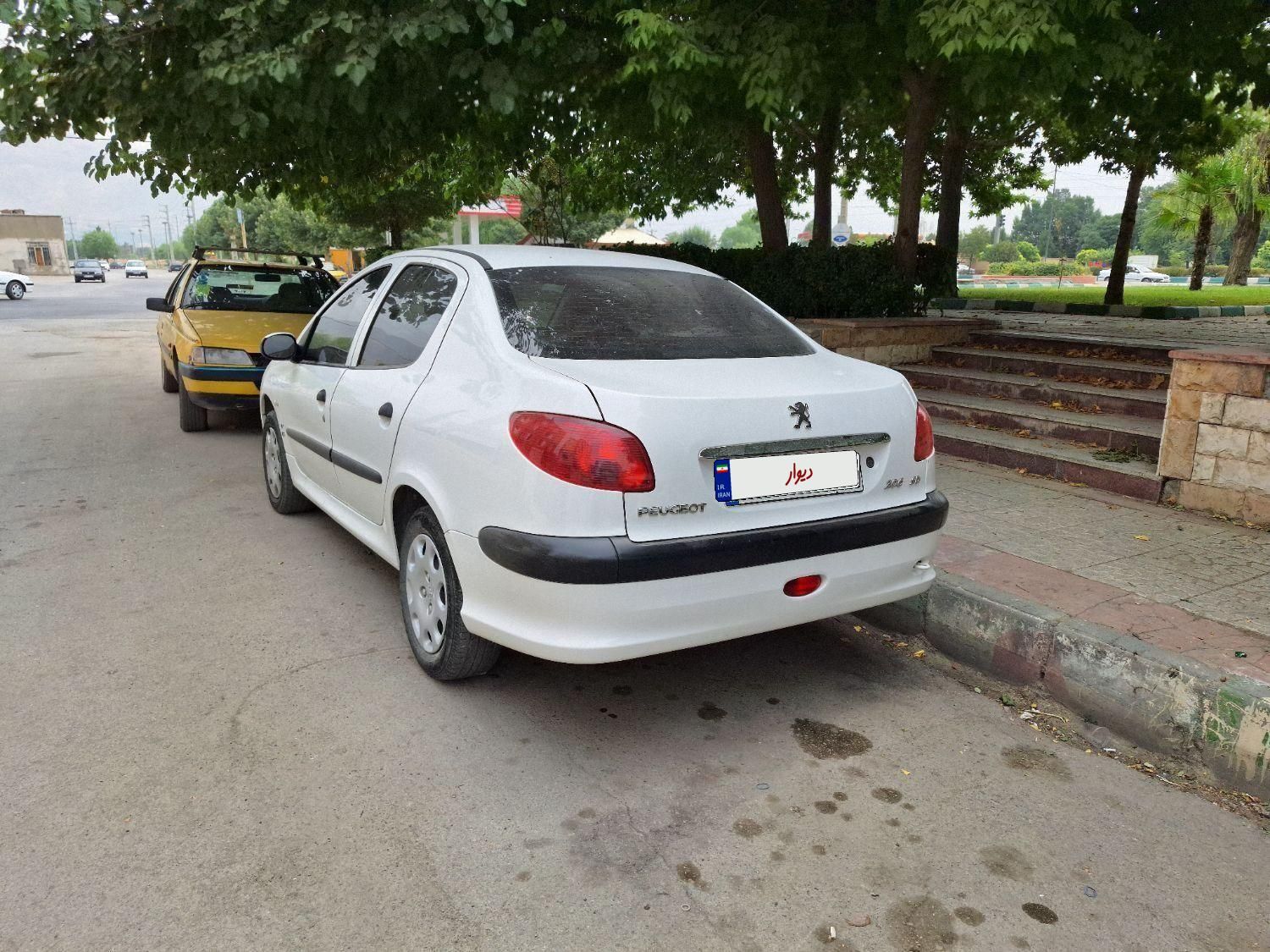 پژو ۲۰۶ صندوق دار v8 - 1400