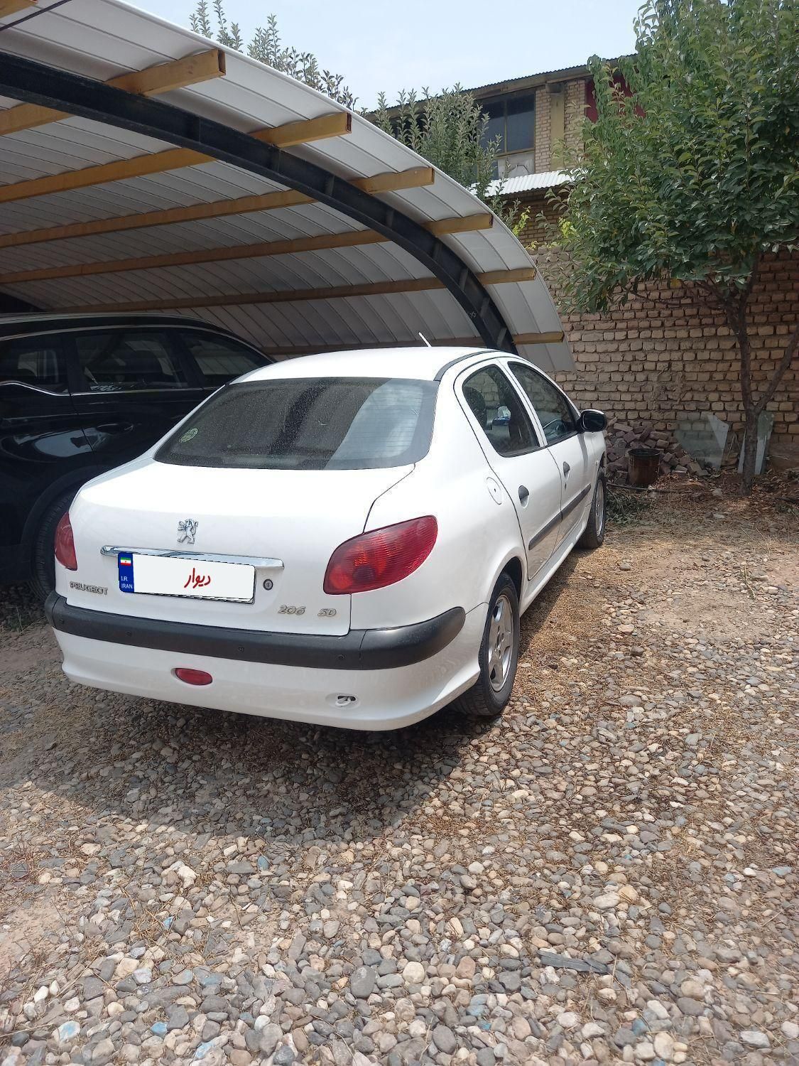 پژو ۲۰۶ صندوق دار v8 - 1398