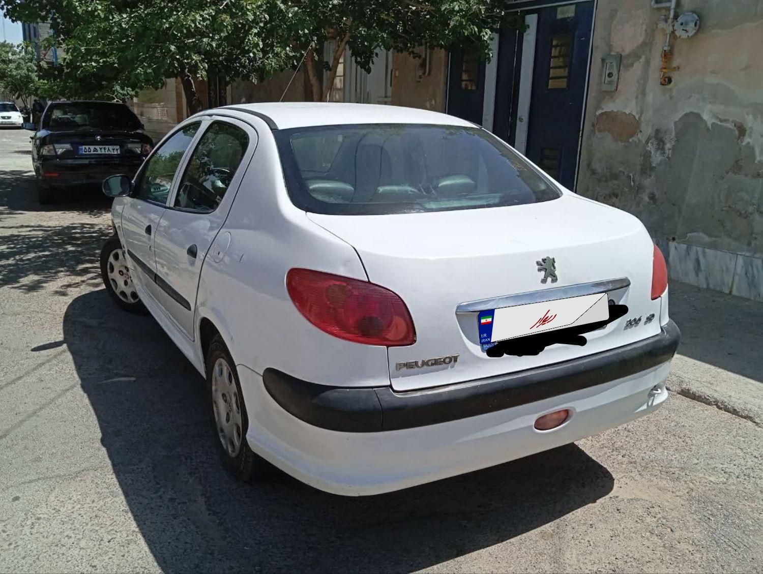 پژو ۲۰۶ صندوق دار v8 - 1391