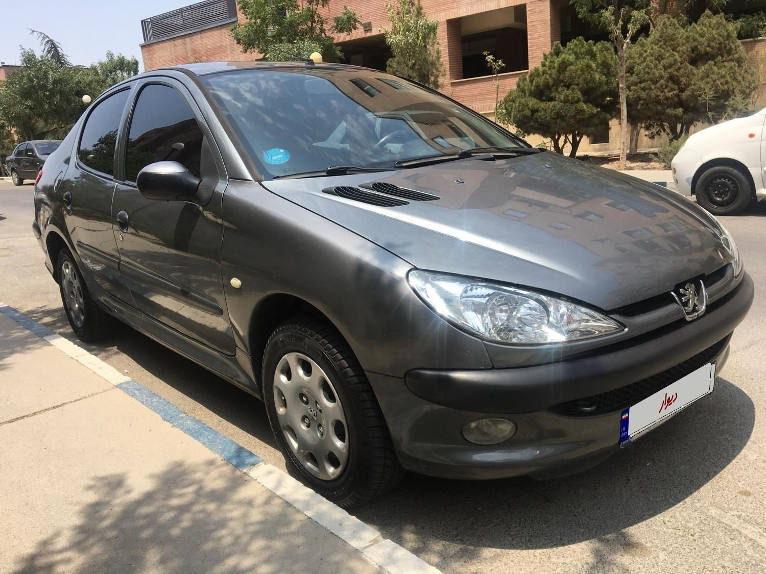 پژو ۲۰۶ صندوق دار v8 - 1393