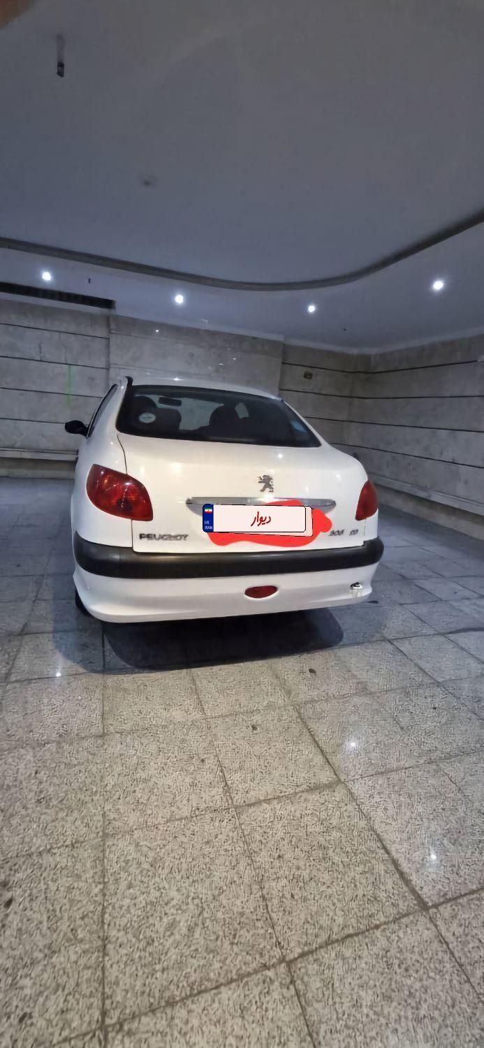 پژو ۲۰۶ صندوق دار v8 - 1397