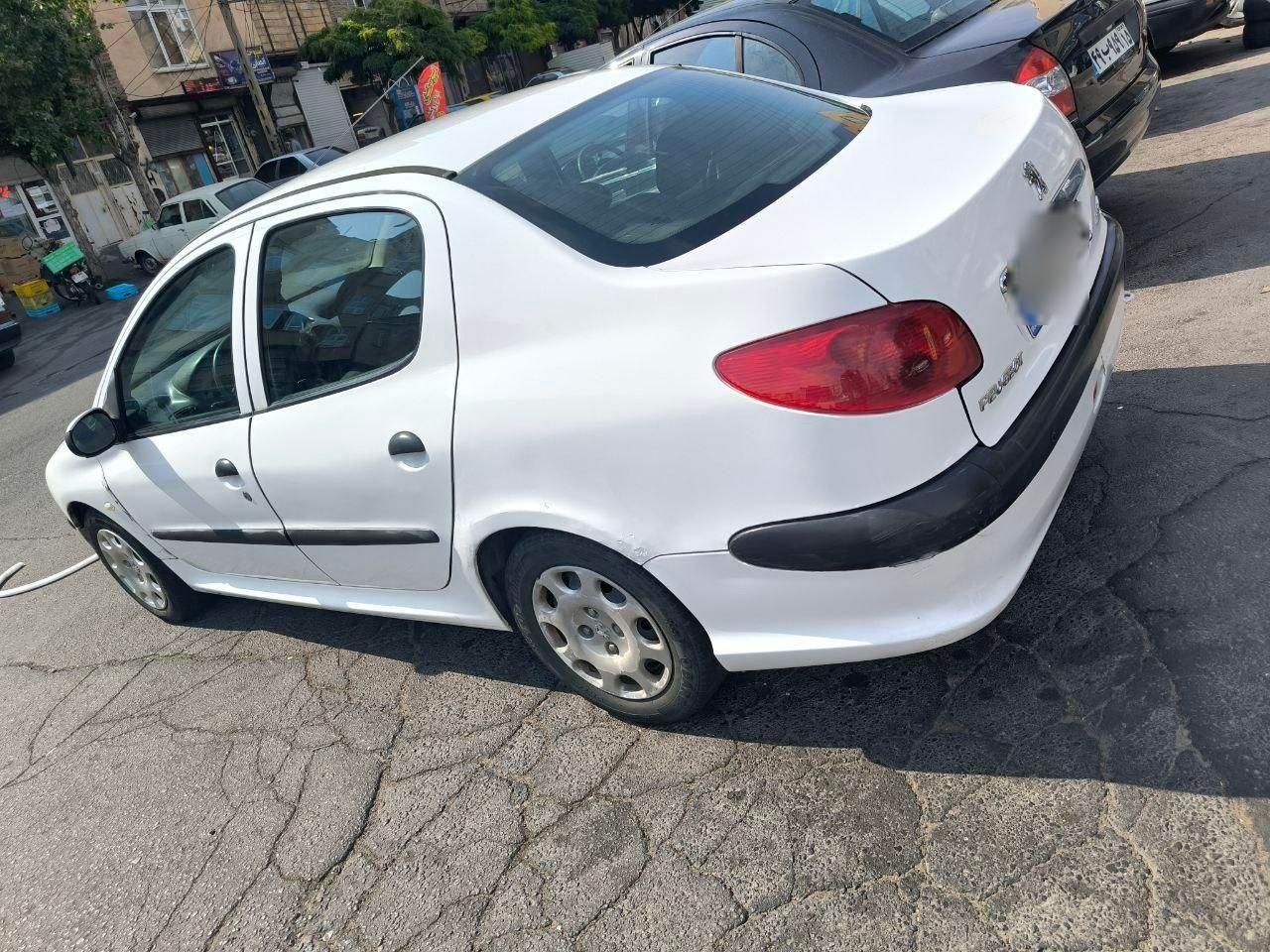 پژو ۲۰۶ صندوق دار v8 - 1394