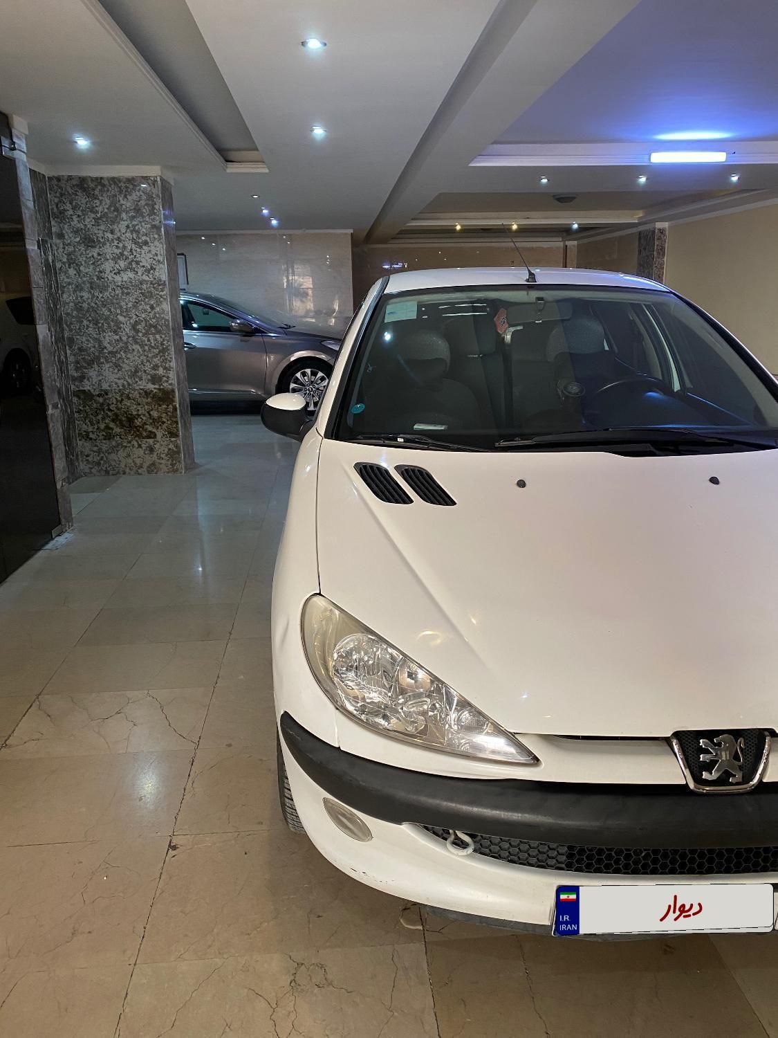 پژو ۲۰۶ صندوق دار v8 - 1396