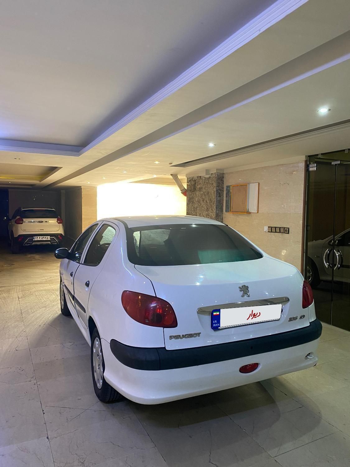 پژو ۲۰۶ صندوق دار v8 - 1396