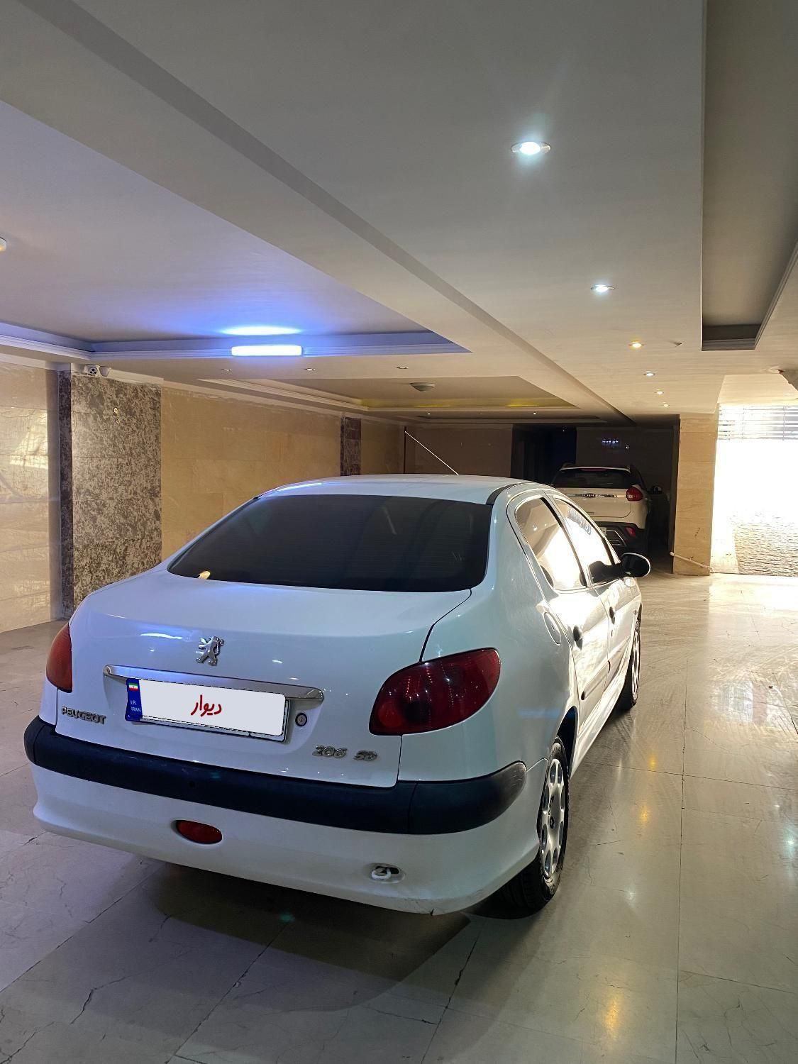 پژو ۲۰۶ صندوق دار v8 - 1396