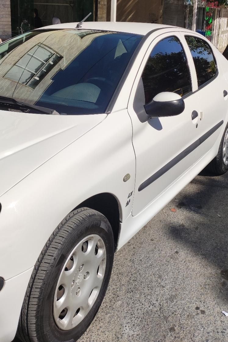 پژو ۲۰۶ صندوق دار v8 - 1396
