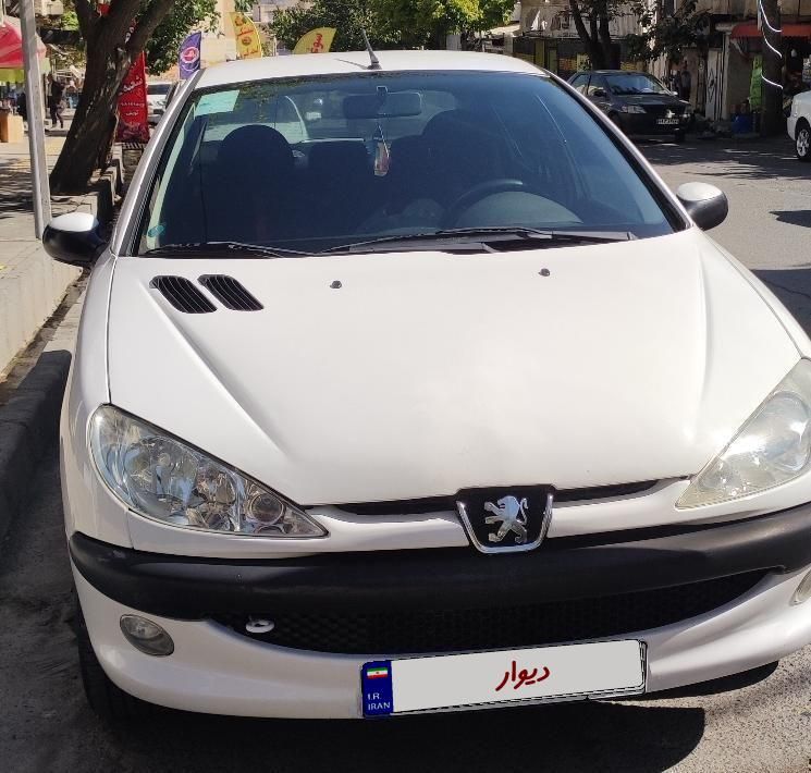پژو ۲۰۶ صندوق دار v8 - 1396