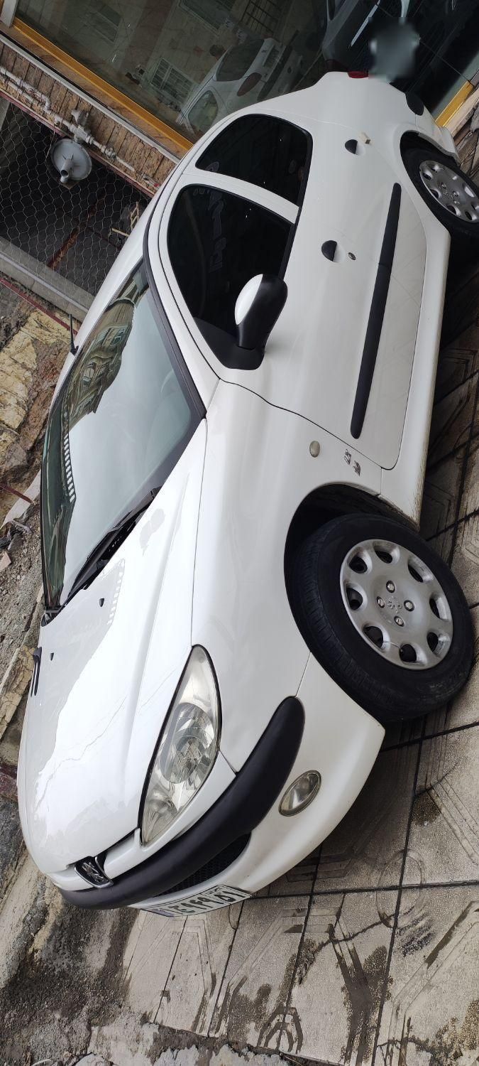 پژو ۲۰۶ صندوق دار v8 - 1396
