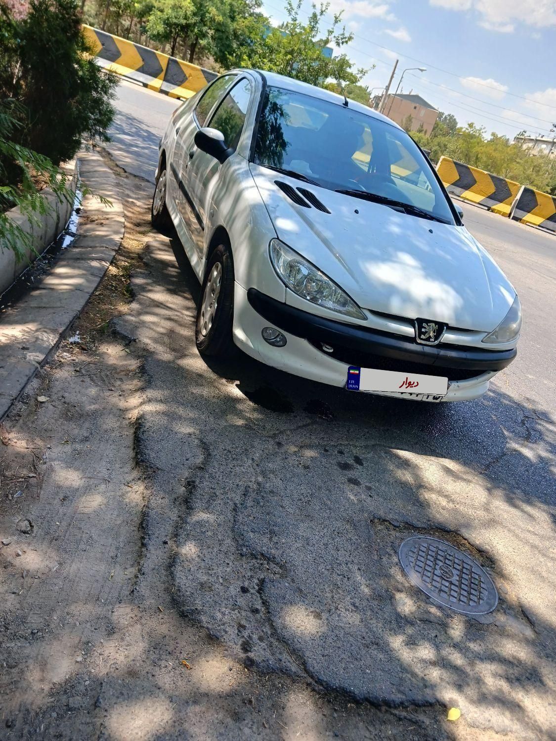 پژو ۲۰۶ صندوق دار v8 - 1394