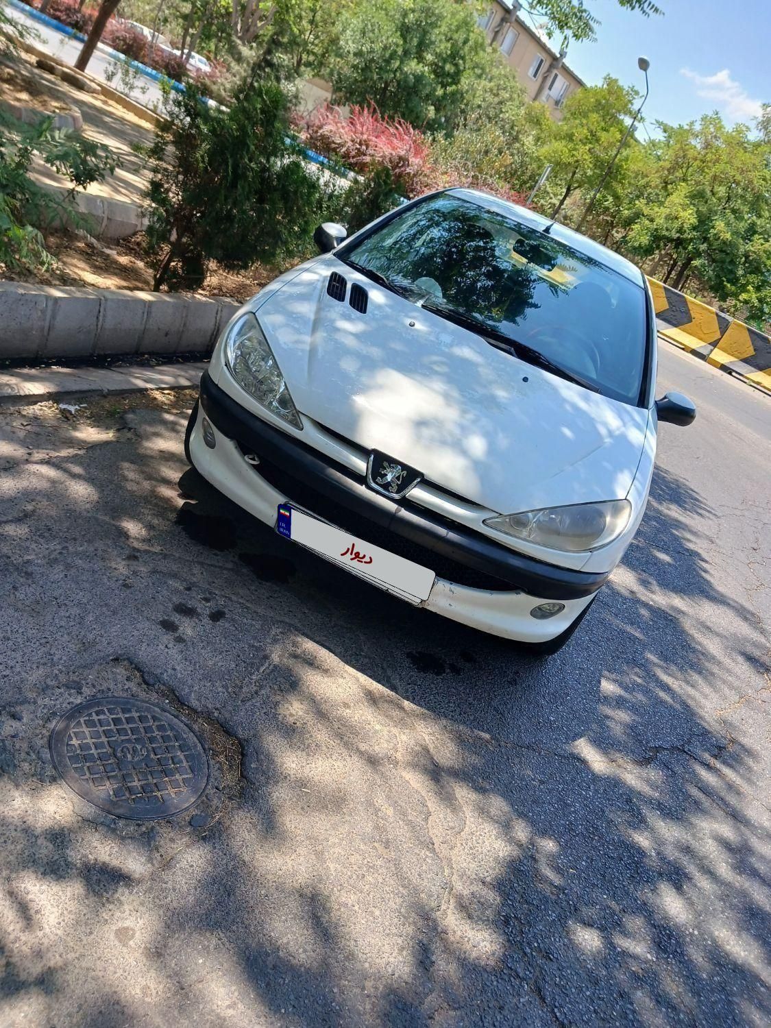 پژو ۲۰۶ صندوق دار v8 - 1394