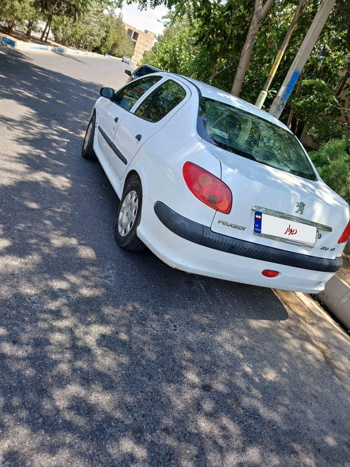پژو ۲۰۶ صندوق دار v8 - 1394