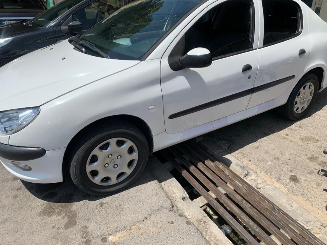 پژو ۲۰۶ صندوق دار v8 - 1397