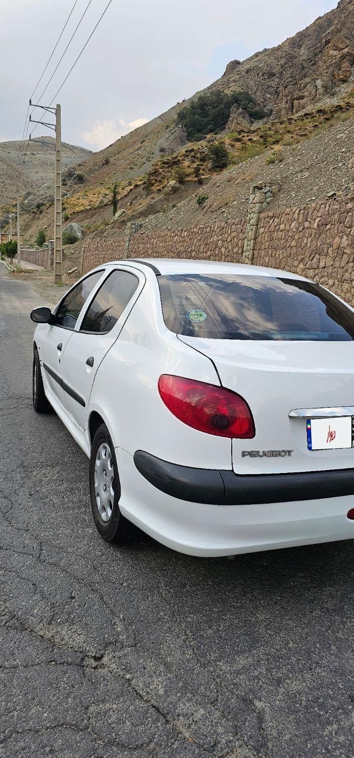 پژو ۲۰۶ صندوق دار v8 - 1398