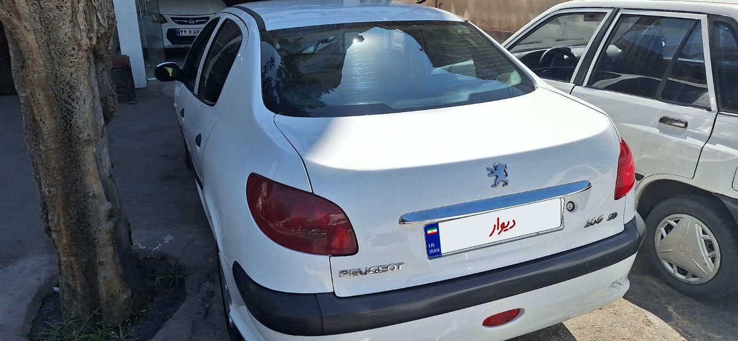 پژو ۲۰۶ صندوق دار v8 - 1390