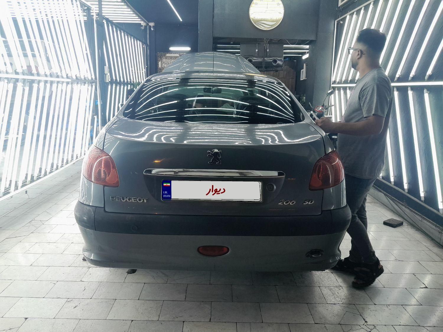 پژو ۲۰۶ صندوق دار v8 - 1395