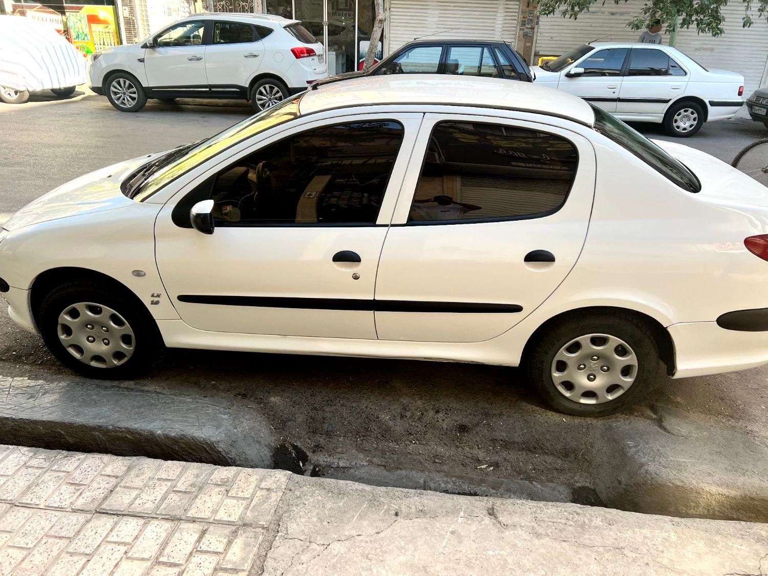 پژو ۲۰۶ صندوق دار v8 - 1399