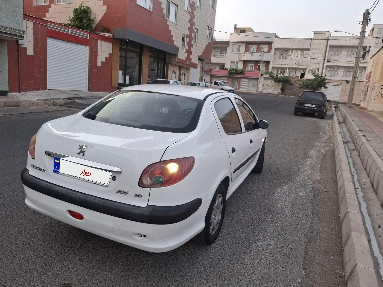 پژو ۲۰۶ صندوق دار v8 - 1394
